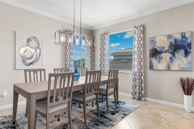 tiled dining space featuring ornamental molding