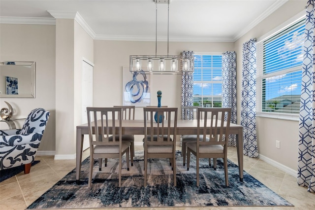 dining space with light tile patterned floors and ornamental molding