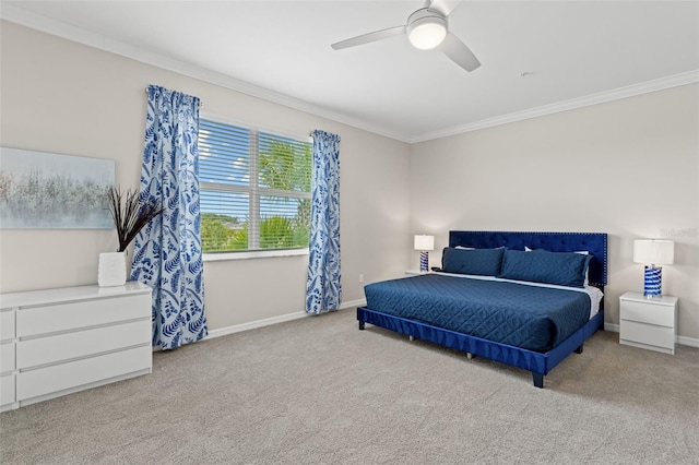 bedroom with ceiling fan, ornamental molding, and light carpet