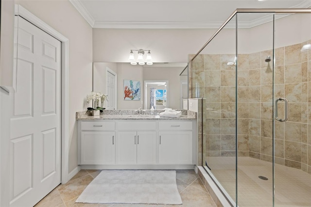 bathroom with vanity, ornamental molding, a shower with door, and tile patterned flooring