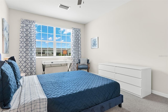 carpeted bedroom with ceiling fan