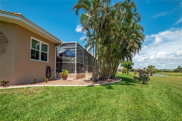 view of yard featuring a lanai