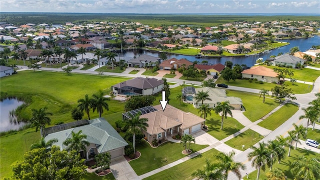 bird's eye view with a water view