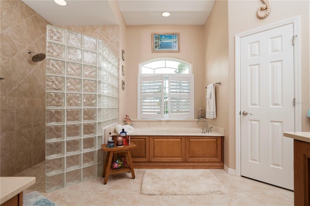 bathroom featuring a garden tub, recessed lighting, walk in shower, and tile patterned floors