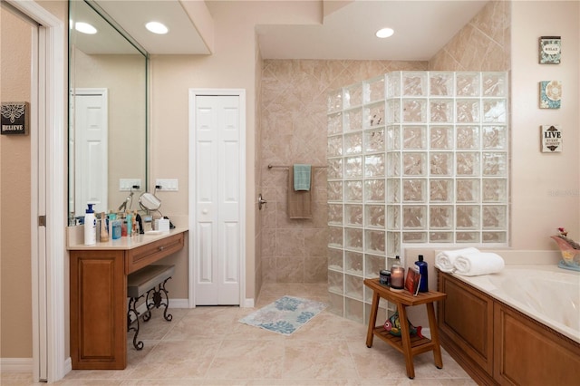 bathroom with a garden tub, recessed lighting, a closet, tile patterned floors, and walk in shower