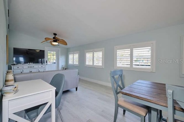 interior space featuring ceiling fan, a healthy amount of sunlight, and light hardwood / wood-style floors