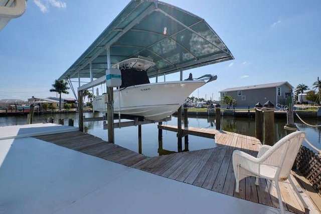 view of dock with a water view