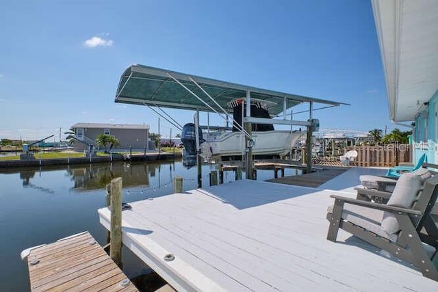 dock area with a water view