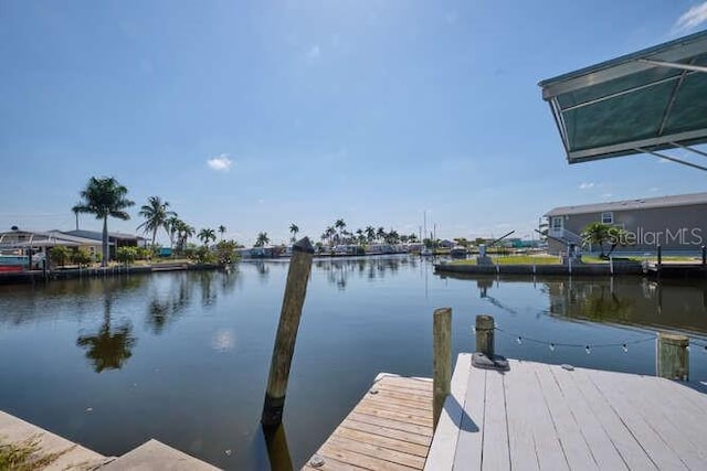 dock area featuring a water view