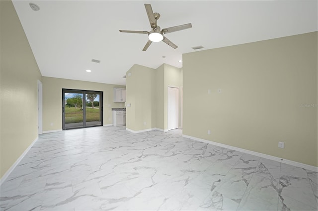 unfurnished living room with ceiling fan