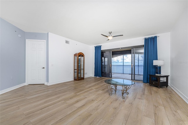 spare room with ceiling fan and light hardwood / wood-style floors