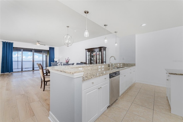 kitchen featuring white cabinetry, ceiling fan, dishwasher, light stone counters, and decorative light fixtures