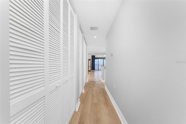 hall featuring light wood-type flooring