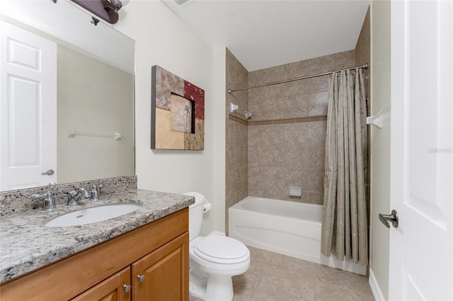 full bathroom featuring tile patterned flooring, shower / bath combination with curtain, toilet, and vanity