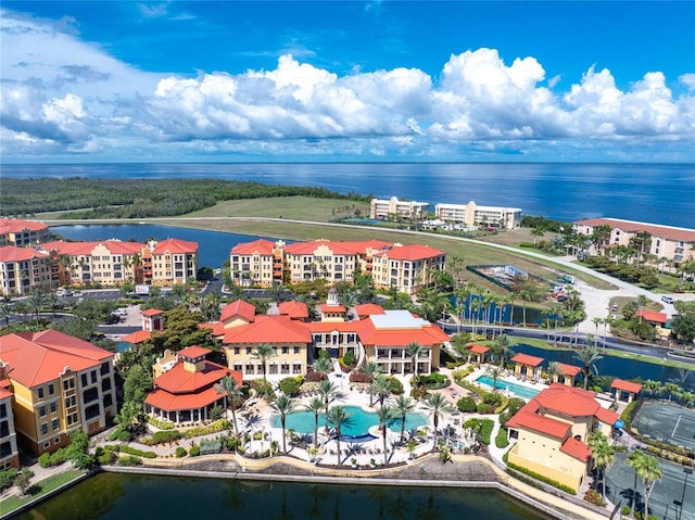 birds eye view of property featuring a water view