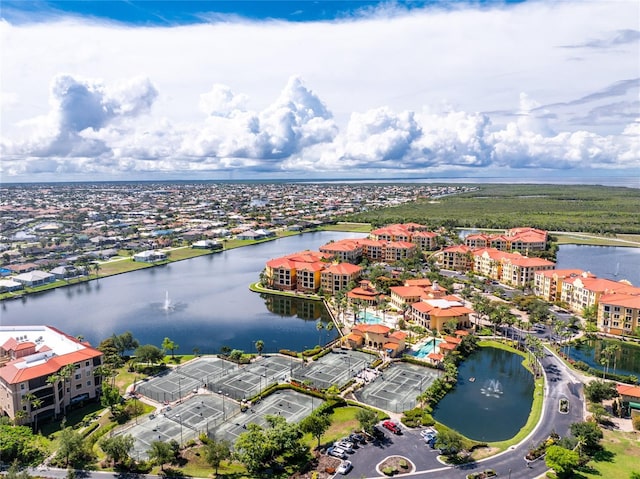 birds eye view of property featuring a water view