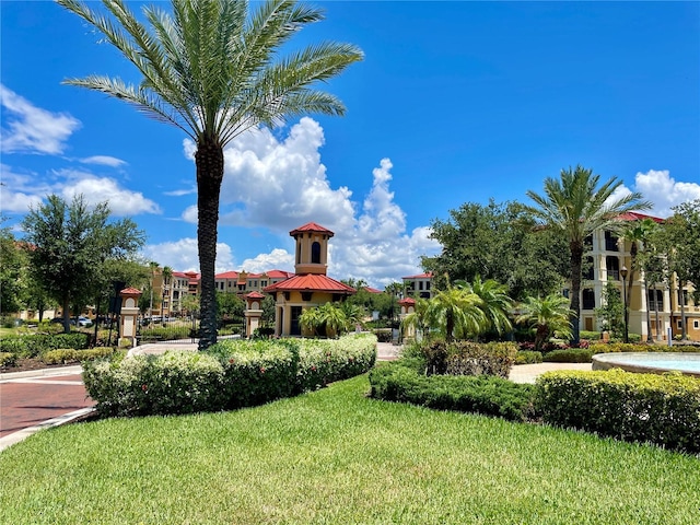 view of community featuring a yard