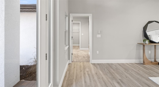 corridor featuring light hardwood / wood-style flooring