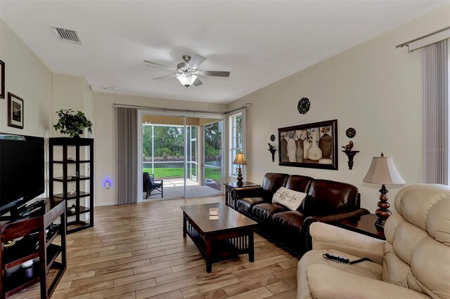 living room featuring ceiling fan