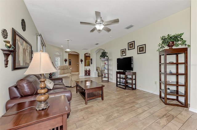 living room with ceiling fan