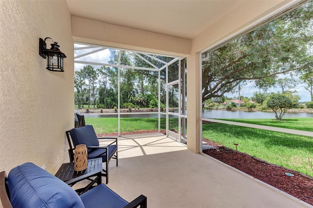 sunroom with a water view