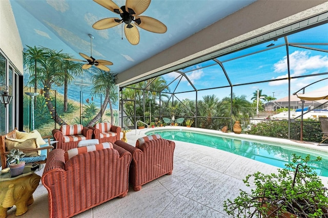 view of pool featuring glass enclosure, a patio area, and outdoor lounge area