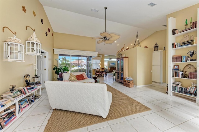 tiled living room featuring vaulted ceiling and ceiling fan