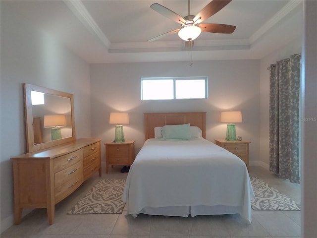 tiled bedroom with a raised ceiling, ceiling fan, and crown molding