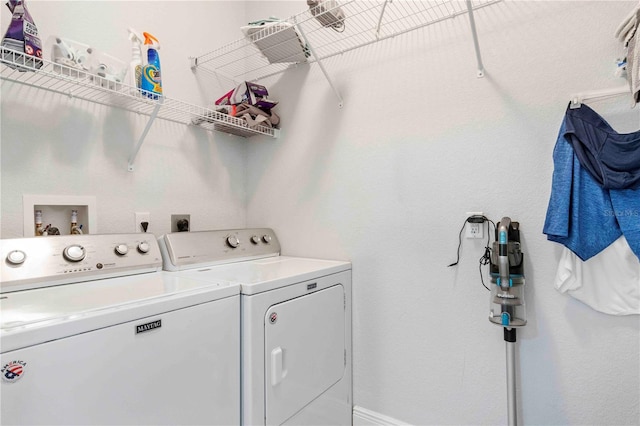 laundry area featuring independent washer and dryer