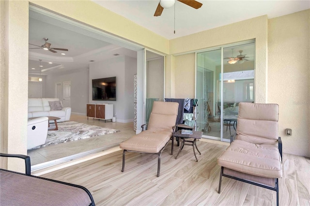 sunroom with a tray ceiling