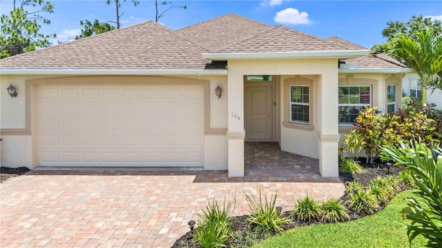 view of front of home with a garage