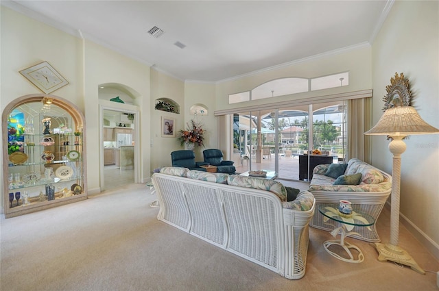 carpeted living room with built in shelves and crown molding