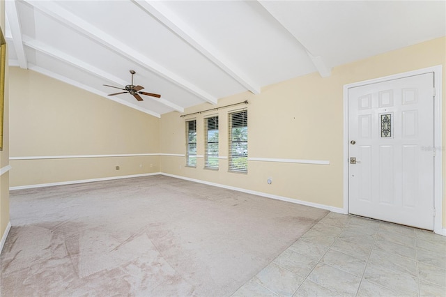 foyer with vaulted ceiling with beams, ceiling fan, and light colored carpet