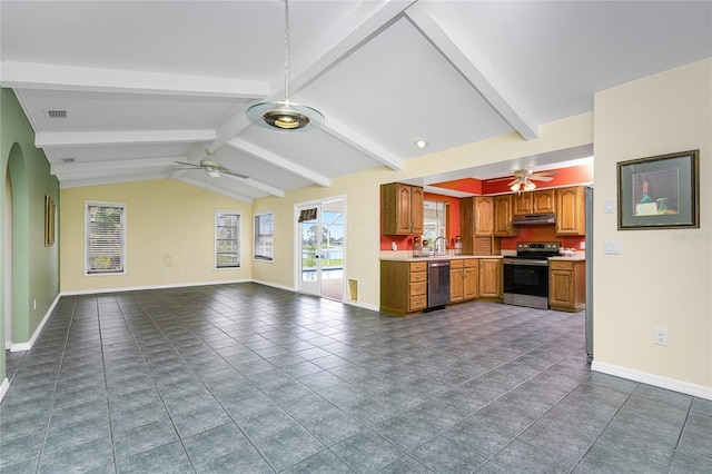 kitchen featuring vaulted ceiling with beams, sink, stainless steel appliances, and tile patterned flooring