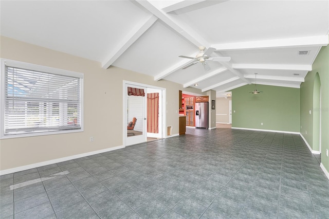 unfurnished living room featuring vaulted ceiling with beams and ceiling fan