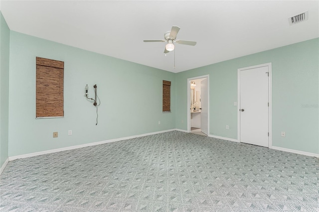 unfurnished room featuring ceiling fan