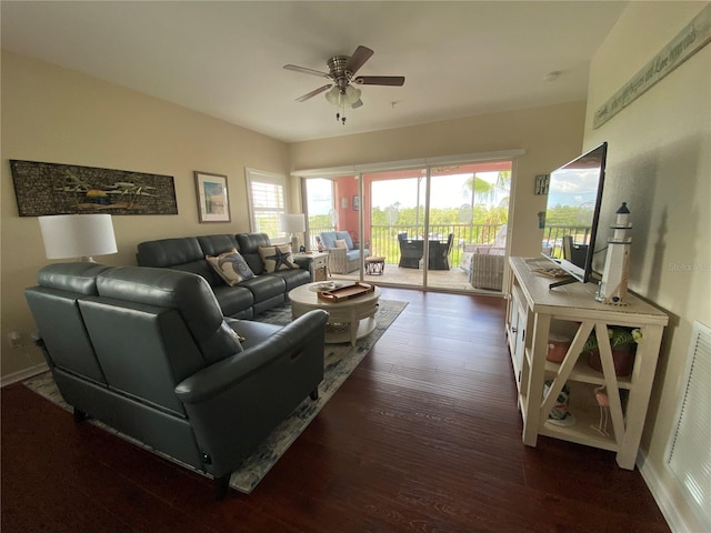 living room with dark hardwood / wood-style floors and ceiling fan