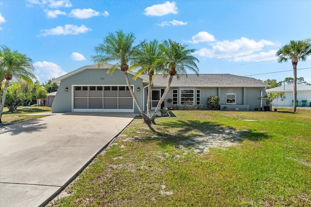 ranch-style house with a garage and a front lawn