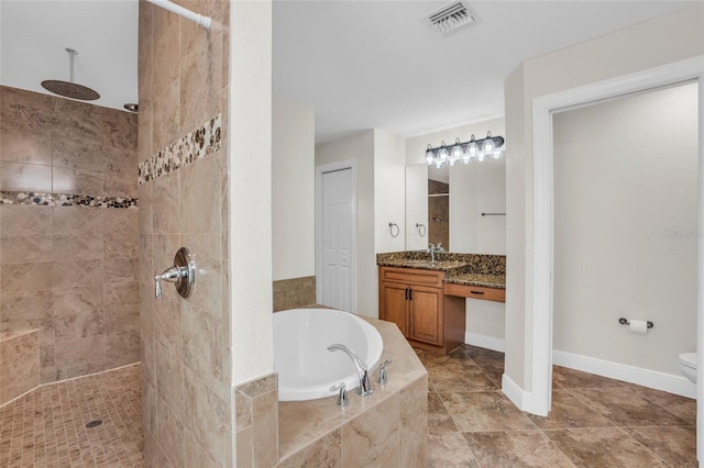 full bathroom with toilet, tile patterned floors, vanity, and separate shower and tub