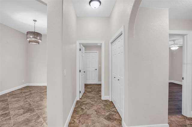 hallway with wood-type flooring