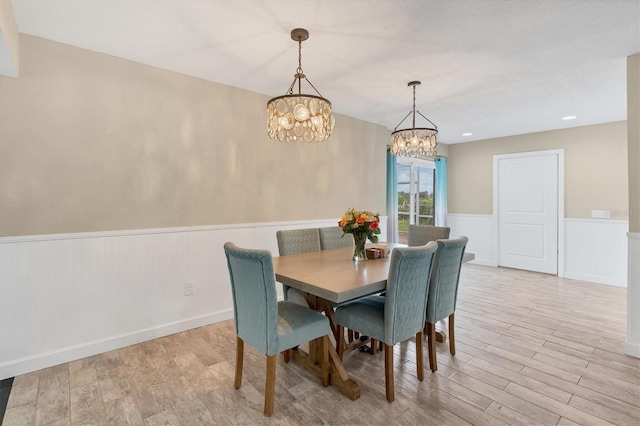 dining space featuring light hardwood / wood-style floors