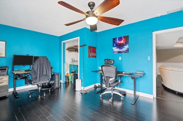 office with ceiling fan, hardwood / wood-style floors, and a textured ceiling