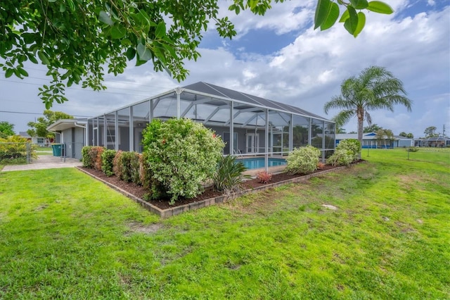 view of yard with a lanai