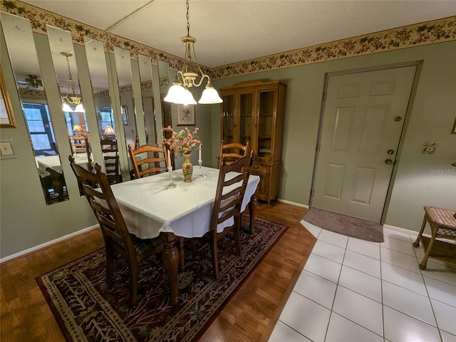 dining space featuring light wood-type flooring