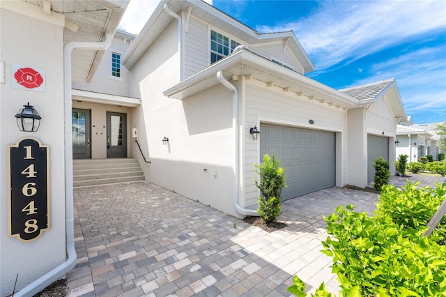 view of front of property featuring a garage