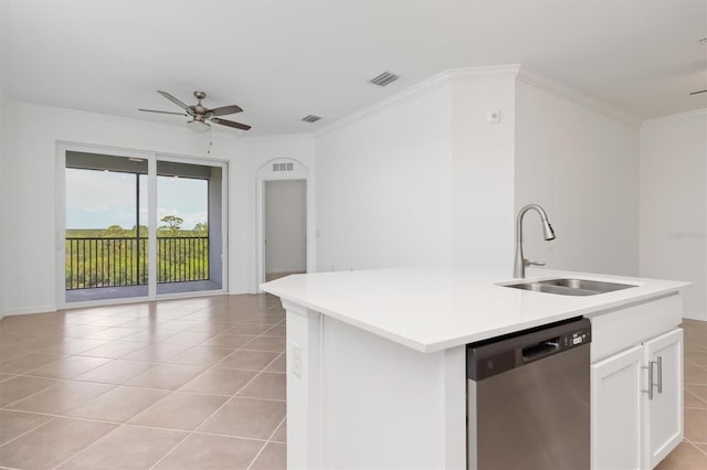 kitchen featuring dishwasher, an island with sink, sink, white cabinets, and light tile patterned floors