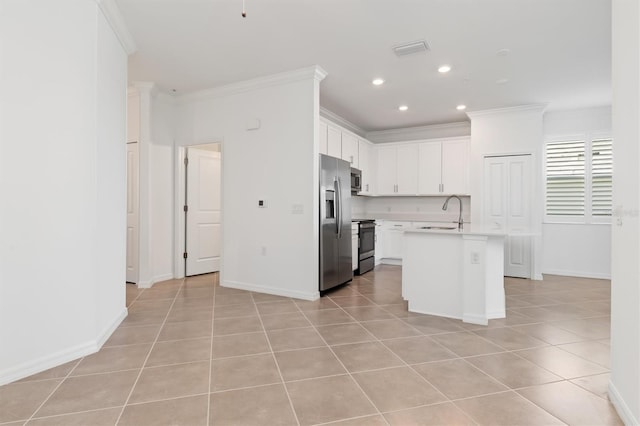 kitchen featuring a kitchen island with sink, light tile patterned floors, crown molding, and stainless steel appliances