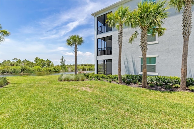 view of yard with a water view