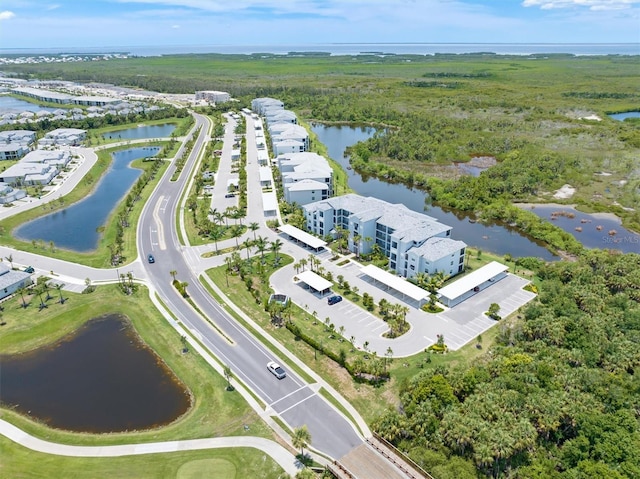 bird's eye view with a water view