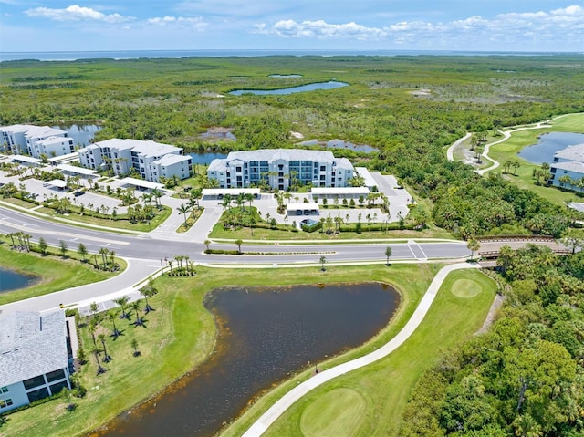 drone / aerial view with a water view